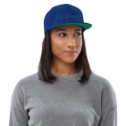 Navy On Teal NuSage Raised Emblem  Royal Blue Snapback Hat